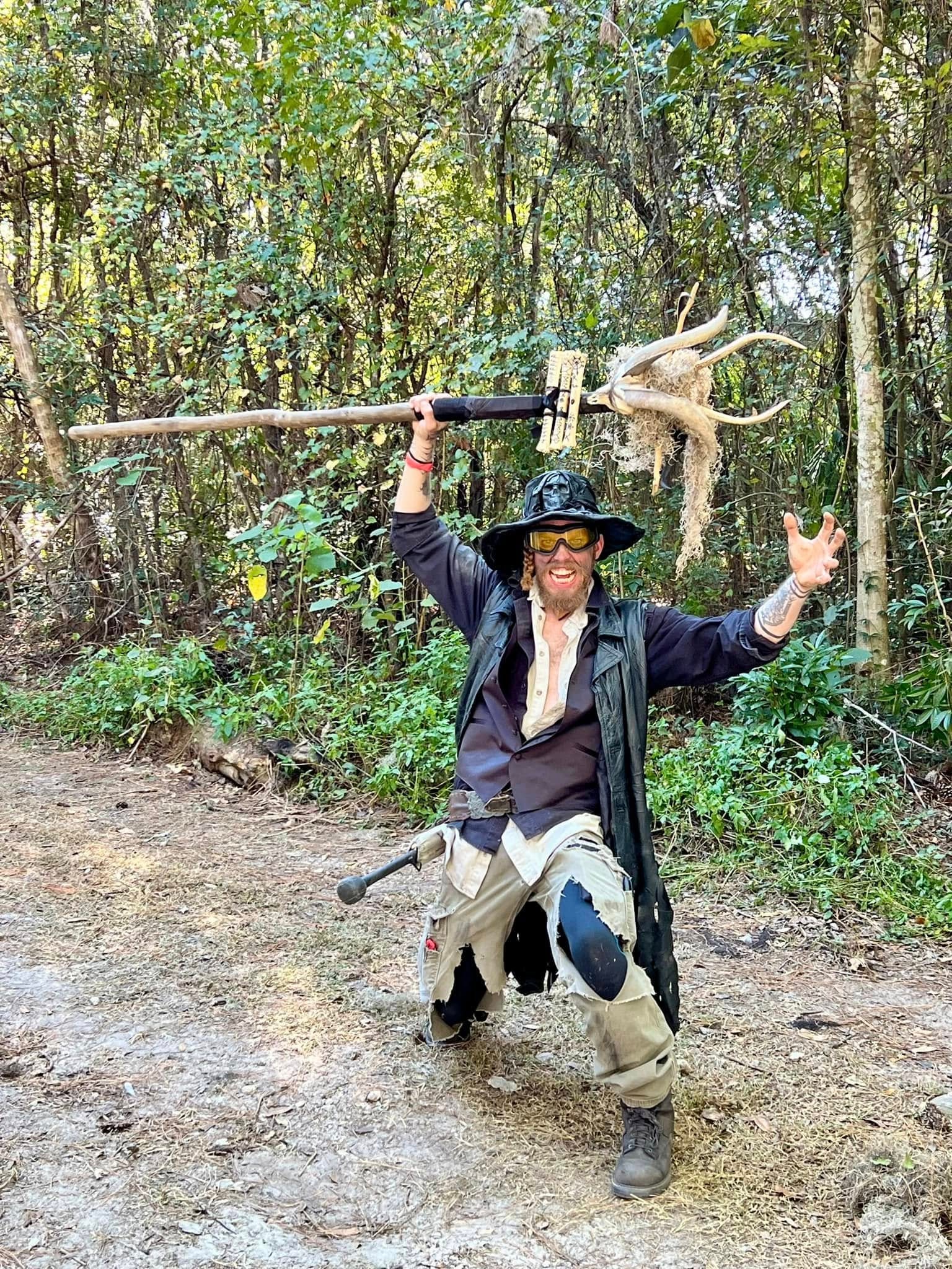 Ravager wielding an antler staff in the Florida forest