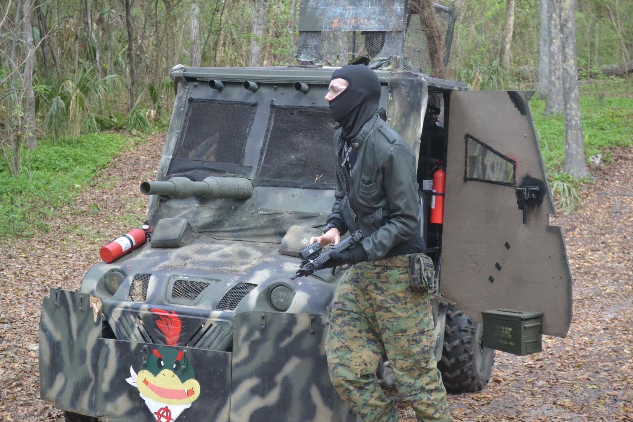 Player standing beside the custom armored vehicle at Amerika