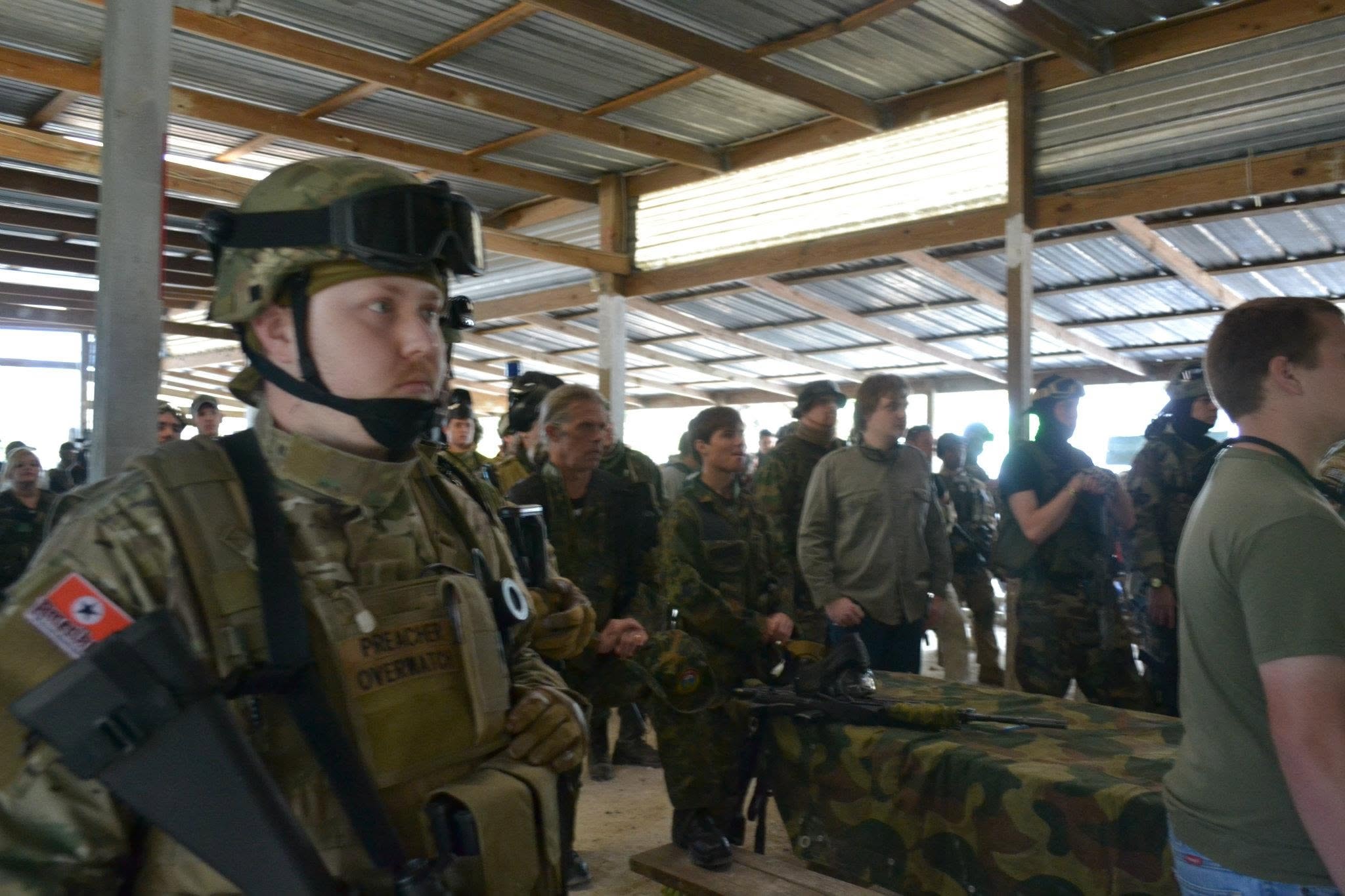 Players assembled under a covered pavilion for the Amerika event briefing