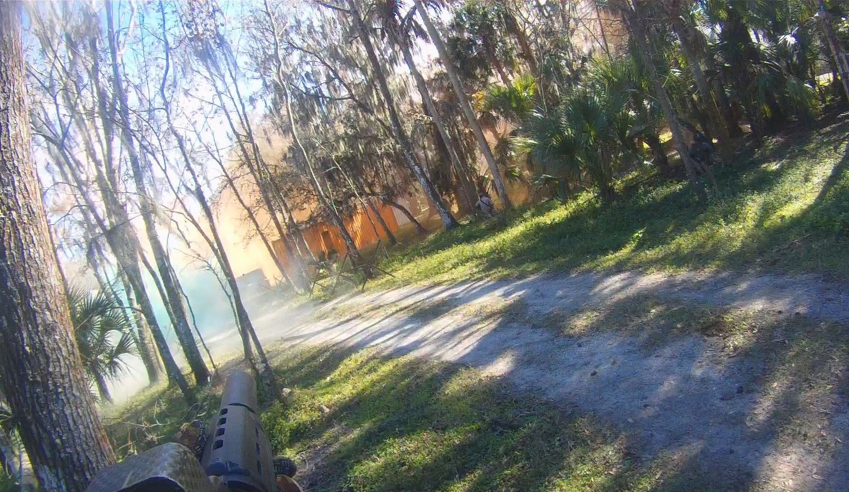 GoPro POV shot advancing through smoke toward the container buildings at Amerika