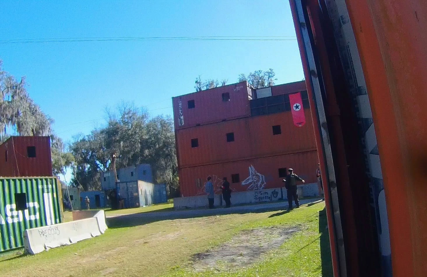 Multi-story shipping container tower with Amerika faction flag flying