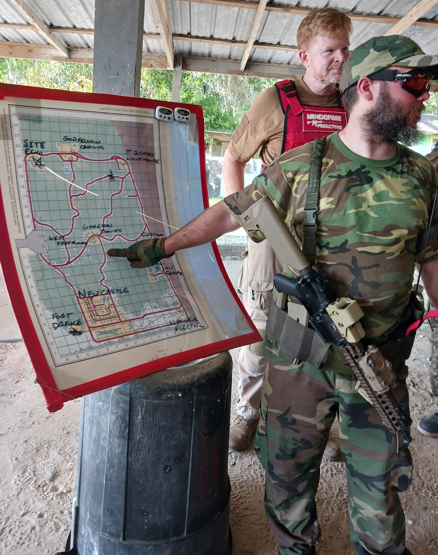 Two players reviewing the King and Country site map