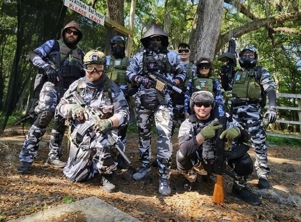 Zone faction group photo at the outdoor venue