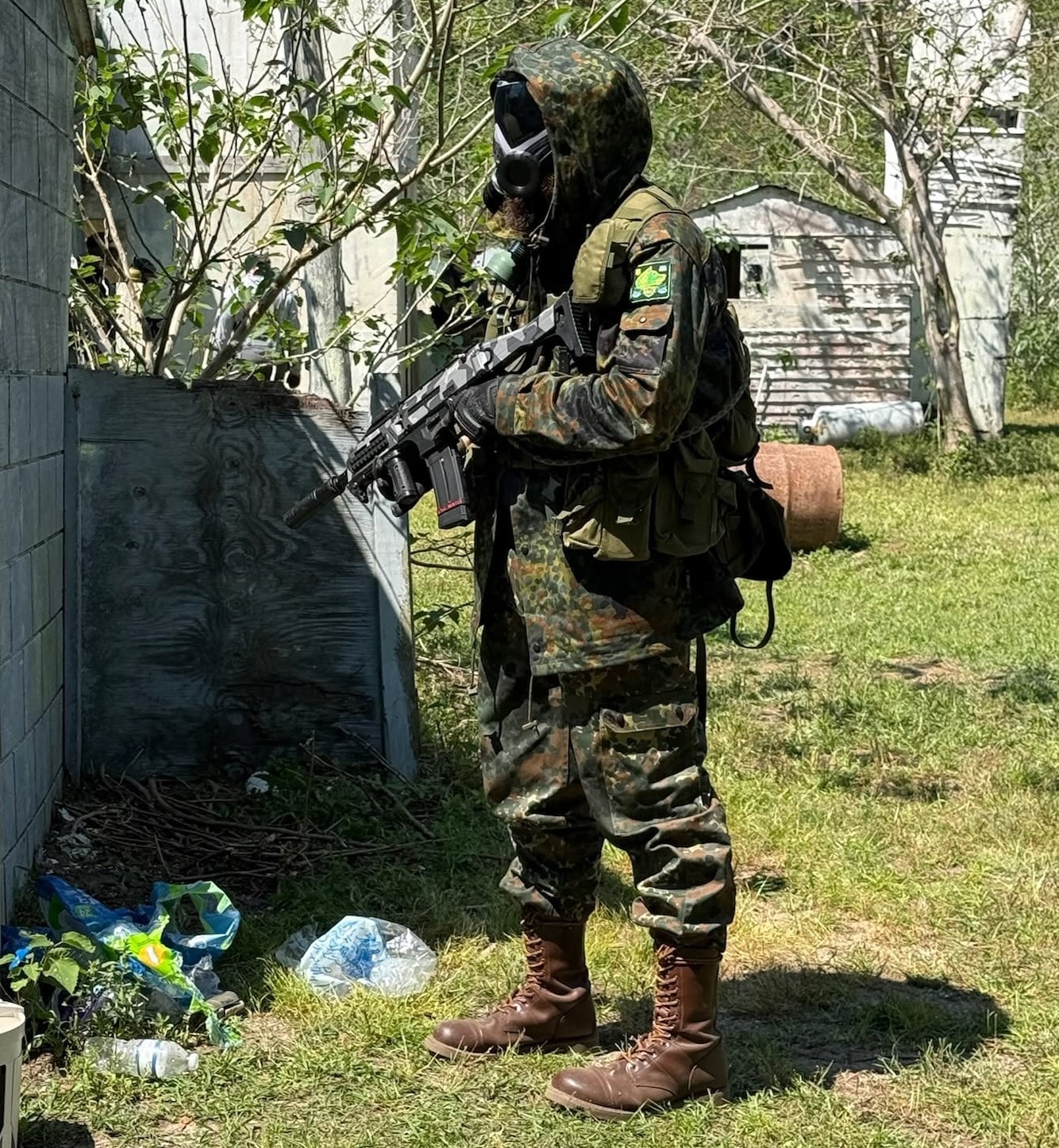 Zone player in camouflage uniform at the outdoor field
