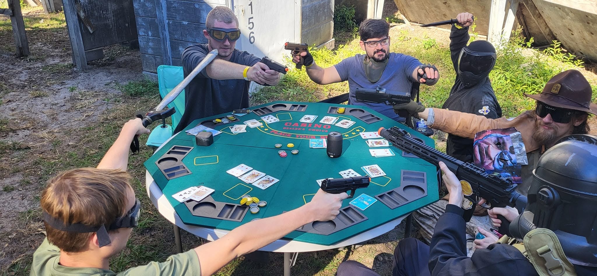 Players at the airsoft poker game