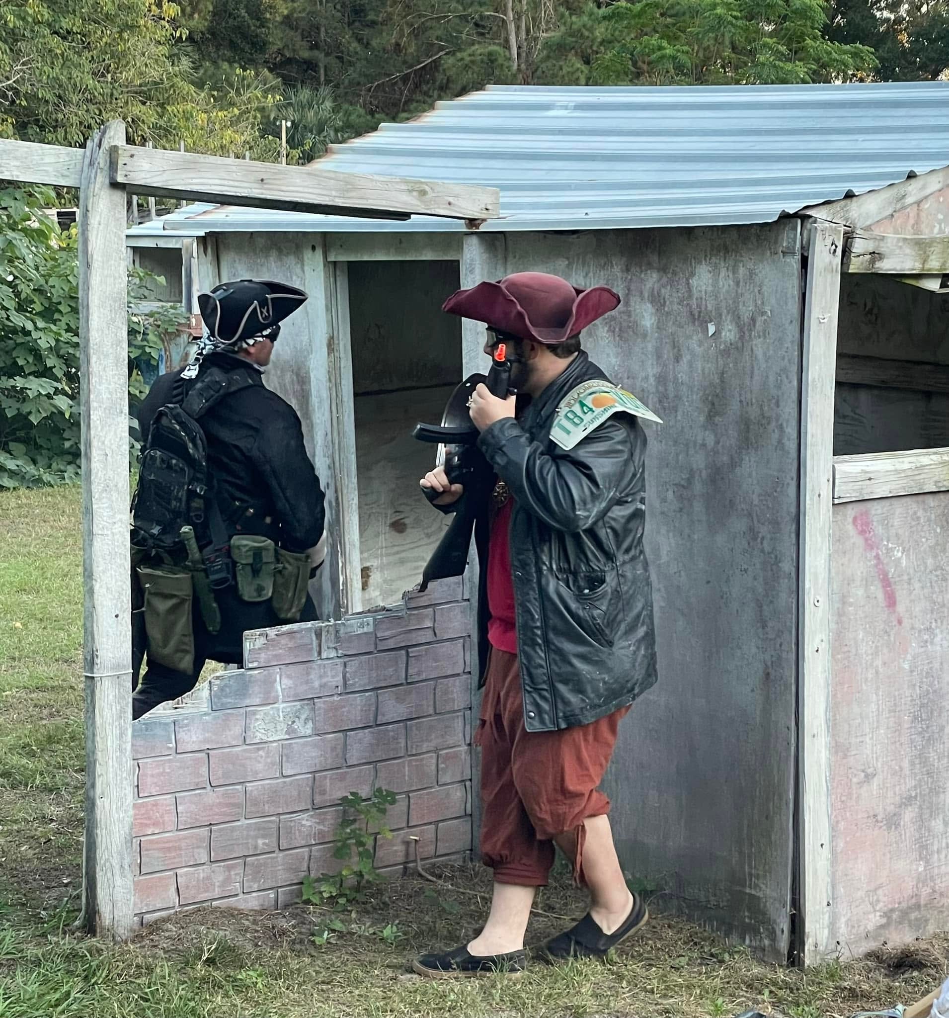 Players in pirate costumes at paintball bunker