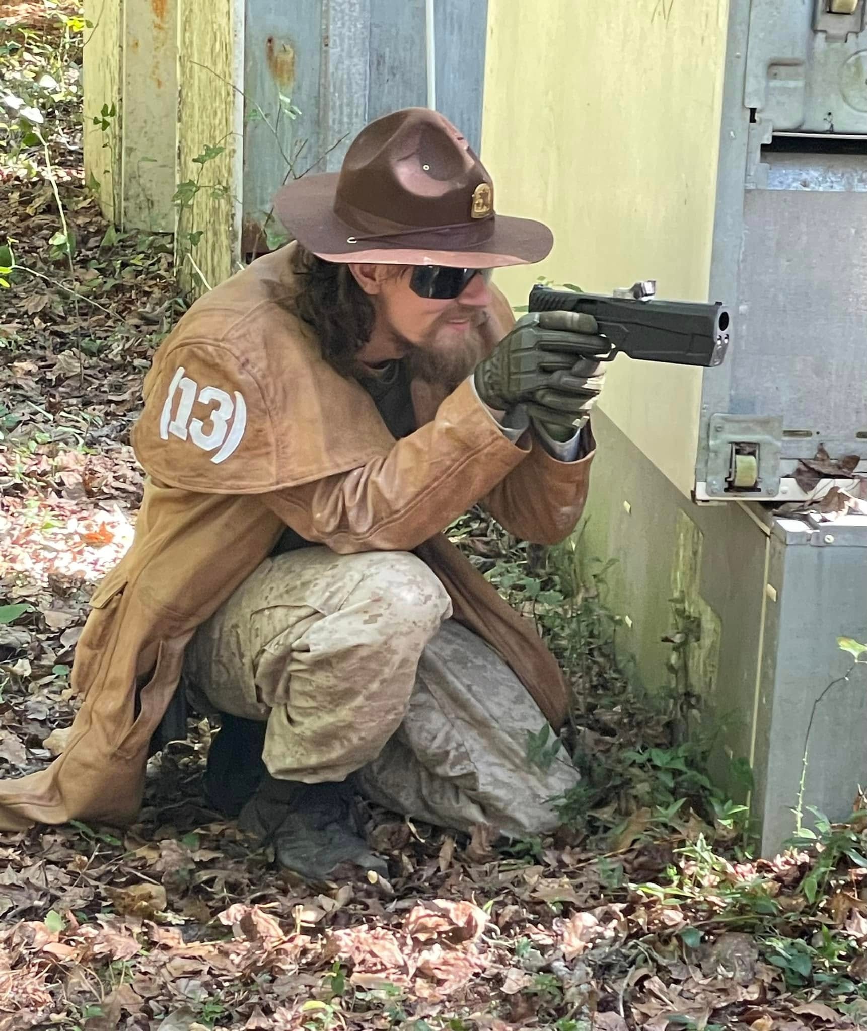 Player aiming pistol at Wasteland
