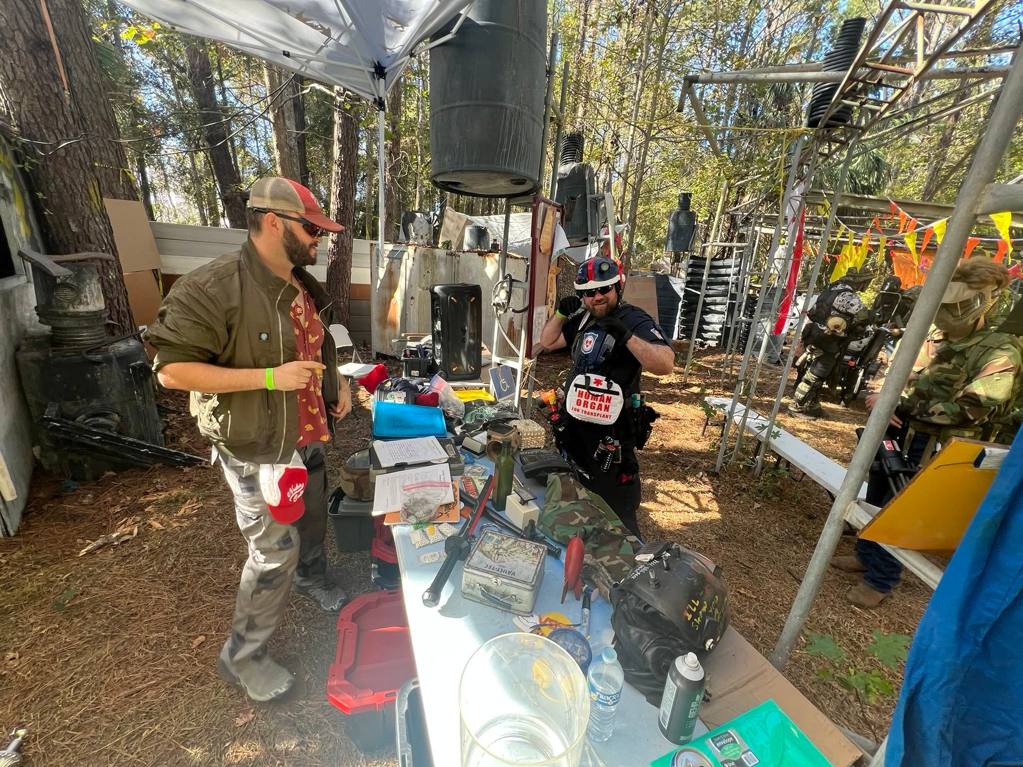 Outdoor festival vendor demonstrating equipment