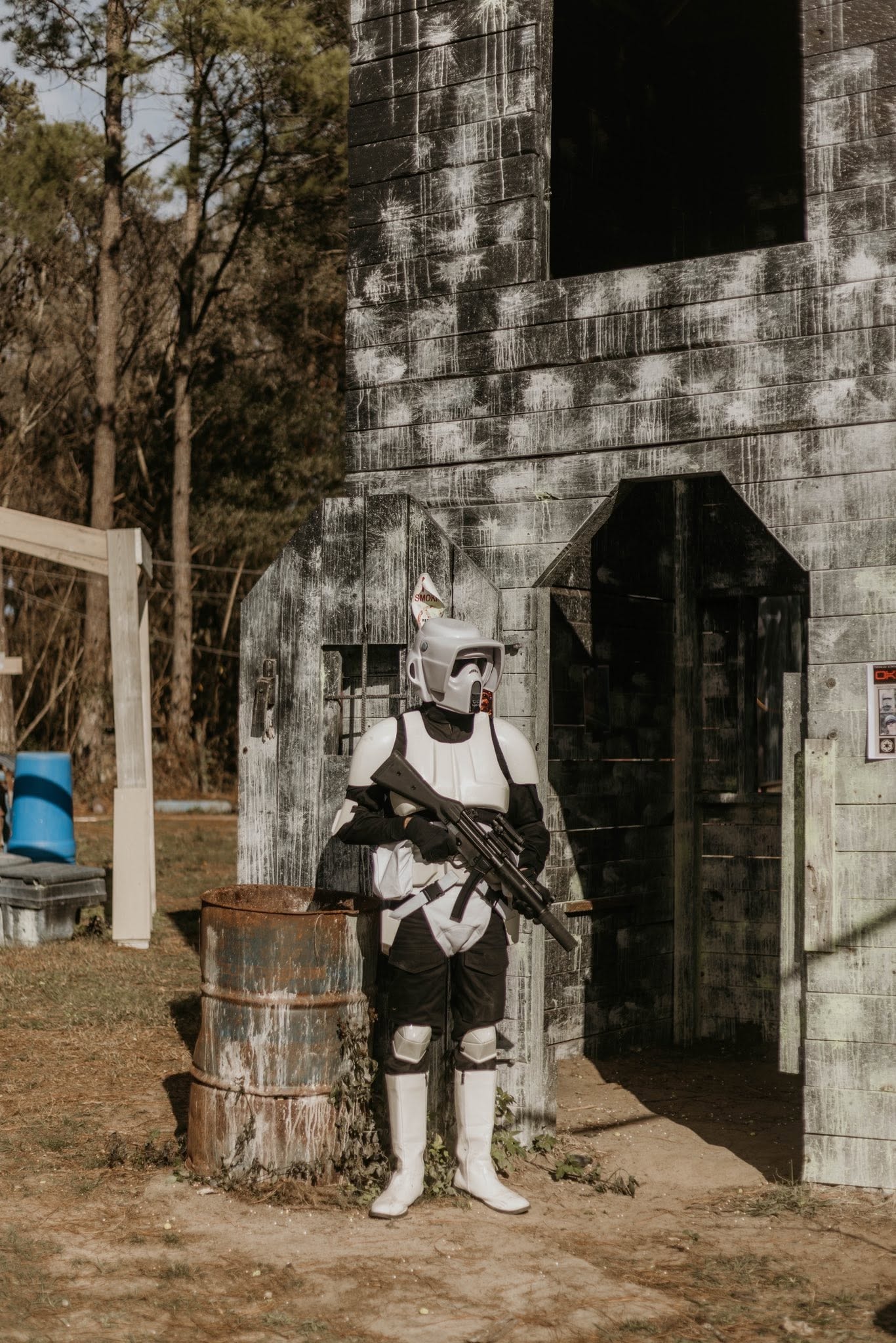 Stormtrooper cosplayer standing in abandoned building