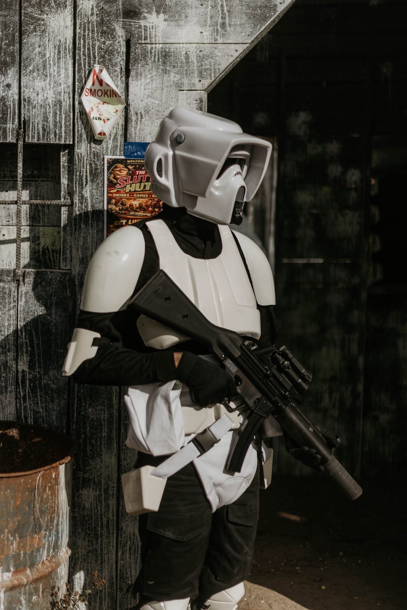 Stormtrooper costumed figure holding rifle